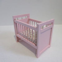 Barneseng, pink m/ blomstret stofmadras, fung. side