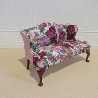 Sofa med rose-stof