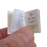 Bog med tekstsider: Puk på kostskole 1952