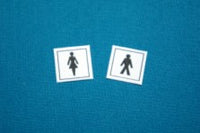 Skilt: dame + herre ,,toilet" pr. sæt