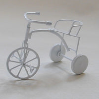 Trehjulet cykel , hvid metal