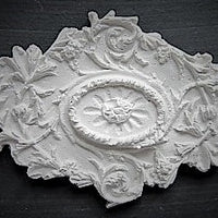 Rosette, gips 6,5 x 4,5 cm