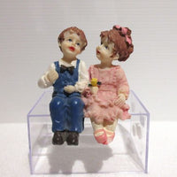 Pige og dreng, resin