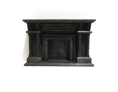 Kamin sortmalet træ