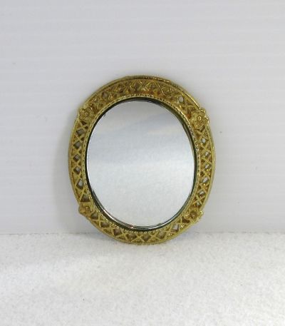Oval spejl med metal guldramme