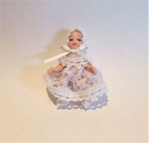 Porcelænsdukke baby i hvid