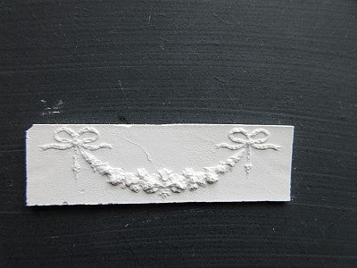 Applikation, gips 7,2 x 2,2 cm
